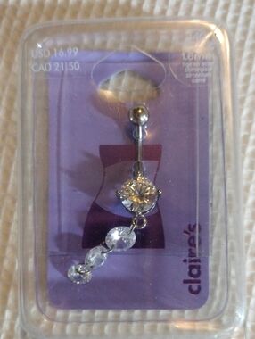 Claire's Silver Clear Crystal Dangle Navel Ring on Purple Card